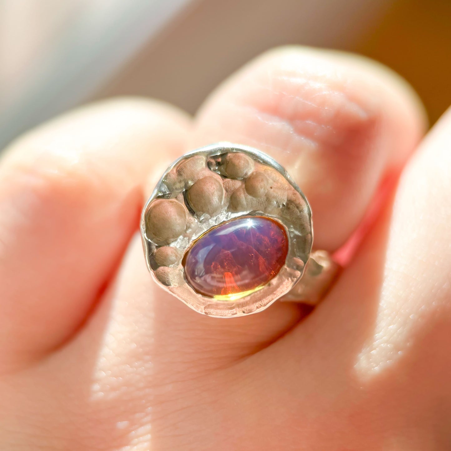 Sunset Glow - Natural Red Skin Dominican Blue Amber Sky Blue Amber Ring